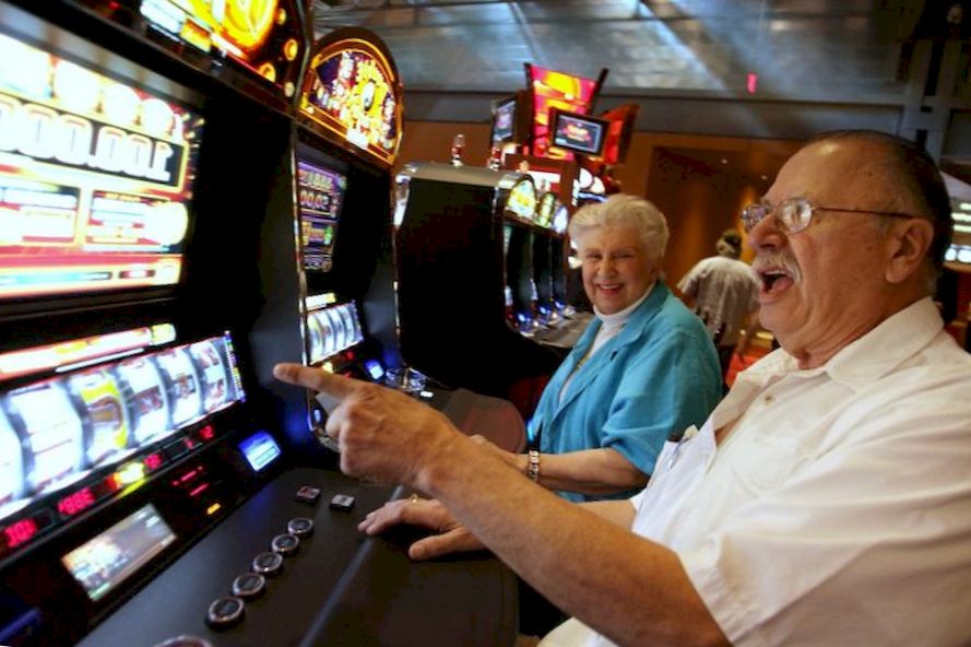 An elderly man won on a slot machine